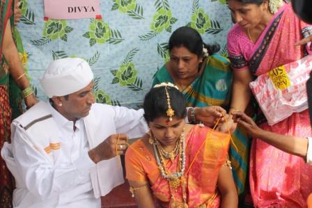 Marriage, groom ties the tali