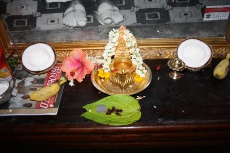 Coin offered to ancestor on betel leaf